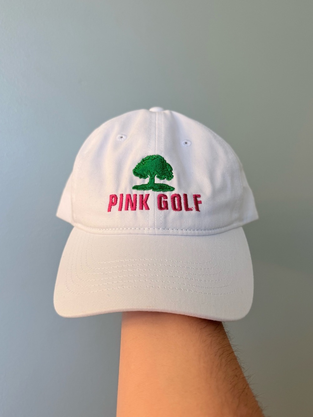Augusta Sportswear White Cap with Green Tree and Pink Text